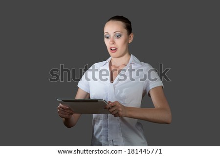 image of young business woman holding a tablet computer
