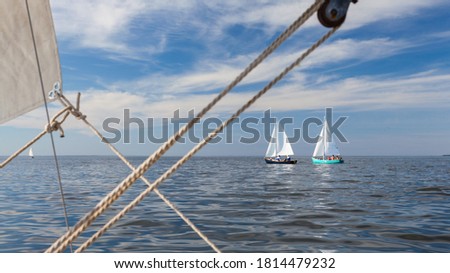 Sailing dinghies, sailing on yachts on water