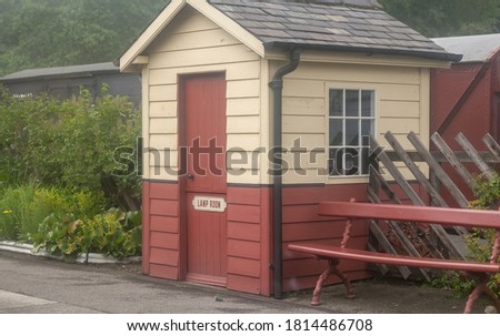 Wooden hut used for railway lamps on the platform of a north yorkshire moors railway (NYMR) line.