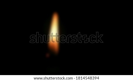 Blurred picture of candle light with dark background
