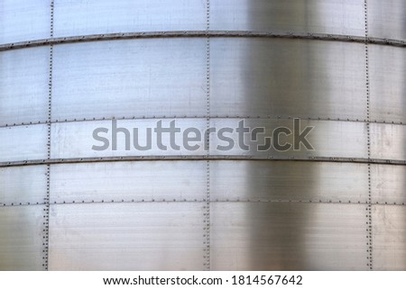 Background made from steel industrial silos for liquids and solids.