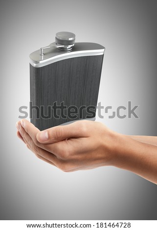 Man hand holding object ( Hip flask )  High resolution 