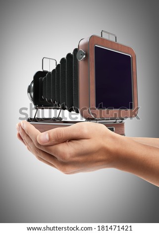 Man hand holding object ( Classic Retro Camera )  High resolution 