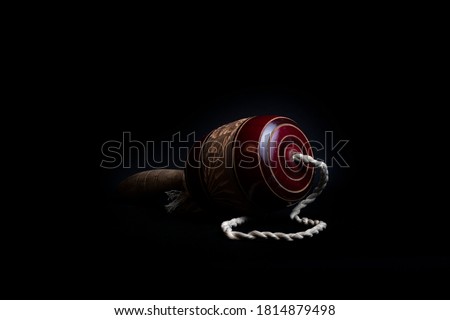 Old wooden children's toy called "Balero" is used in canteens and in offerings of the dead in Mexico Royalty-Free Stock Photo #1814879498
