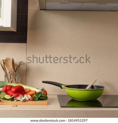 marble kitchen sink with glass-ceramic - vegetable preparation - copy space - square shape - focus on vegetable