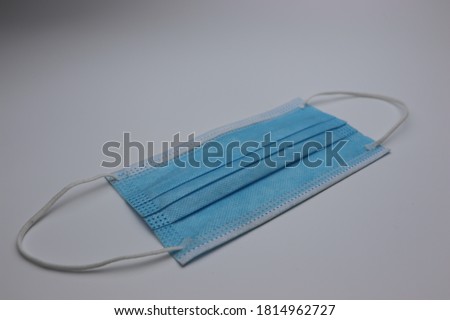 three layer face mask isolated with white background