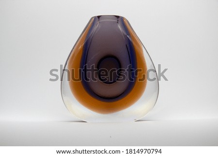 Colored glass vase made of metallurgical glass