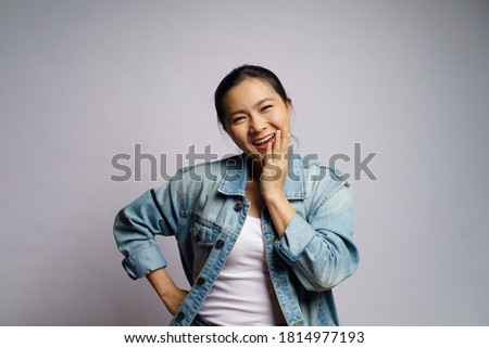 Asian woman happy confident looking at camera, isolated on white background.