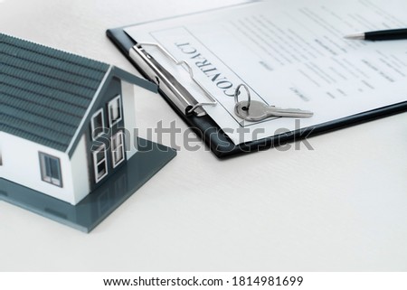 Real estate concept  Property contract for house selling or rental.