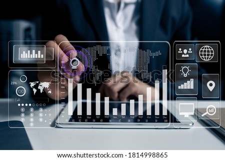 Double exposure of businesswoman hand working on tablet computer with digital network online virtual chart, Abstract icon, Business strategy concept, Background toned image blurred.