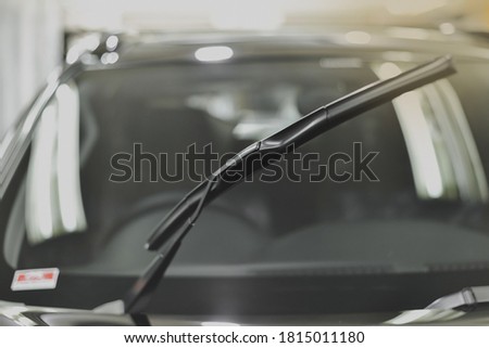 A windscreen wiper or windshield wiper is a device used to remove rain, snow, ice and debris from a windscreen or windshield