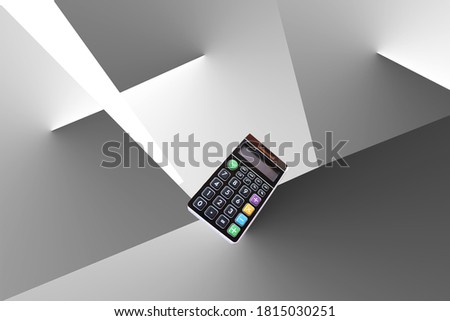 Calculator int he middle of a gradient lit geometric space