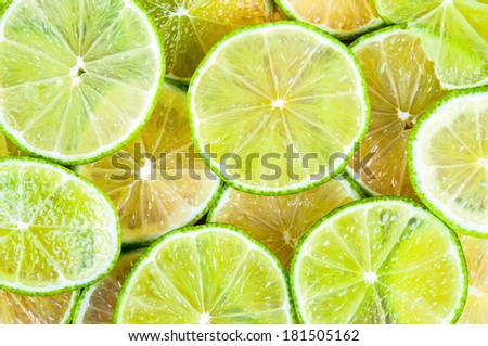 Background made of fresh ripe lime slices