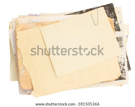 pile of old mail and old photos  isolated on white background