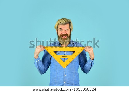 Maths and geometry. back to school. favorite subject and disciplines. Education at school. home learning concept. man teacher use triangle tool. bearded tutor man with ruler. draw and measure.