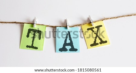 TAX concept - colorful sticky notes with word seo on the white background