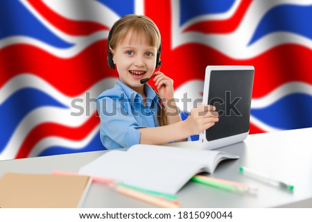 Little girl student with laptop on uk flag background, England