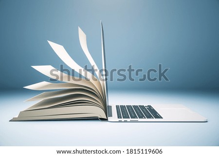 Abstract book and open laptop. Online education and webinar concept. 3D Rendering