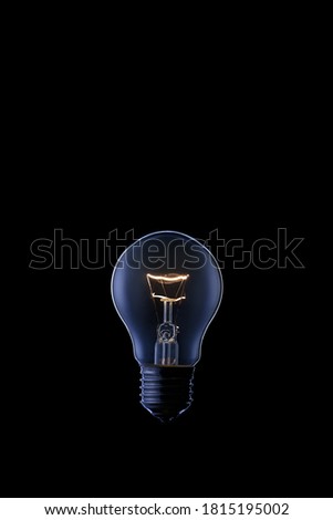 Light bulb on a black background