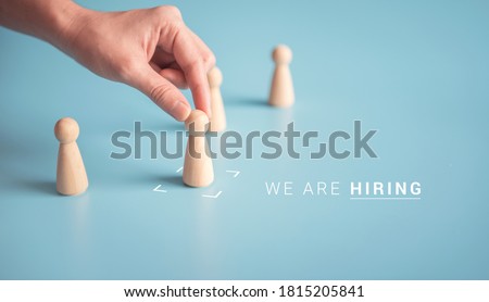 We are hiring, Hand choose the best person from group of human icon for the job vacancy Royalty-Free Stock Photo #1815205841