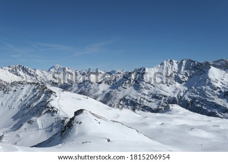 Panorama of Alps and ski slope view in La Thuile, Aosta Valley in Italy. Italian Alps in winter.