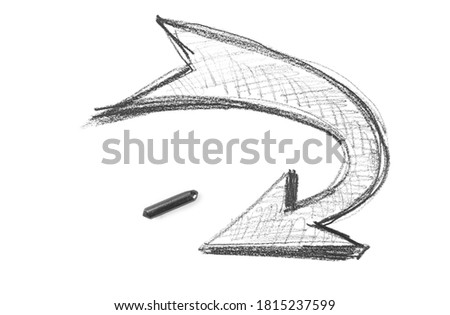 Graphite stick with turning arrow hatching, sketching isolated on white background, top view