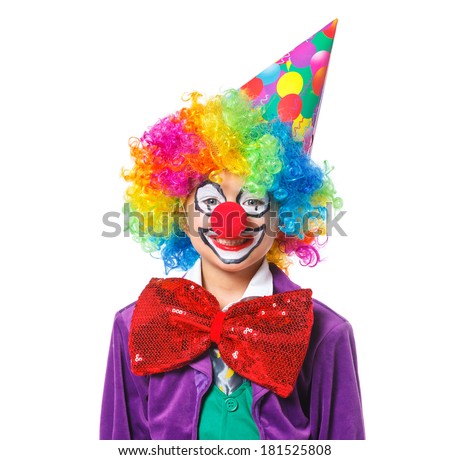 Portrait of a cute boy clown. Isolated on white background.