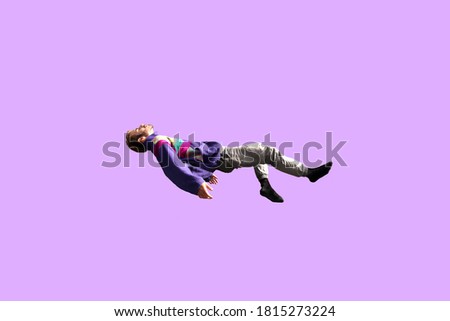meditation concept. young man floating on a pink background