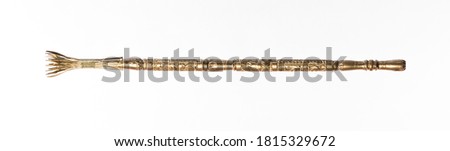 golden witch stick isolated on white background Royalty-Free Stock Photo #1815329672