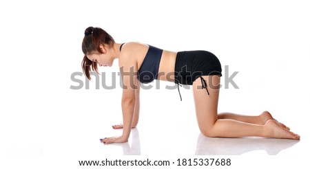brunette with her hair tied in a sports top and shorts shows how to do the exercises on a white background. A woman stands sideways to the intention, squatting, straightening her back