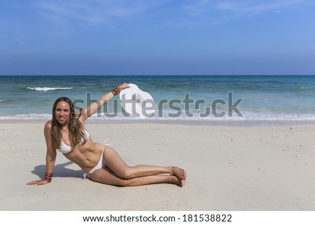 Beautiful woman enjoying the beach life.