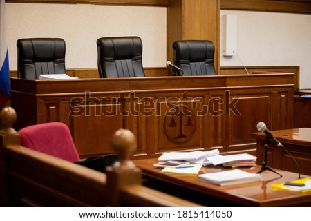 A courtroom in a Russian court, an empty judge's chair Royalty-Free Stock Photo #1815414050