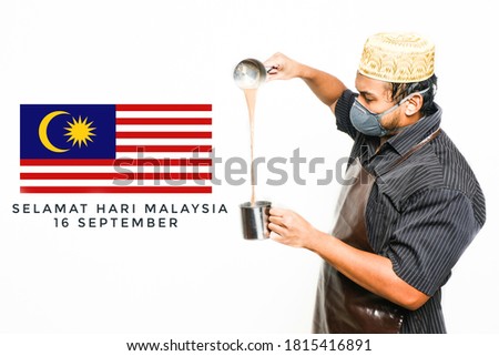 A picture of men making "teh tarik" with Malaysia flag insight. Malay words written "Selamat Hari Malaysia" meaning Happy Malaysia Day.