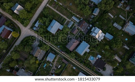 aerial shot of small countryside houses