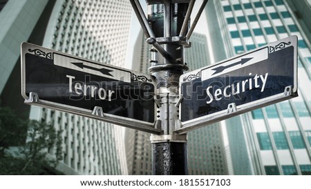Street Sign the Direction Way to Security versus Terror