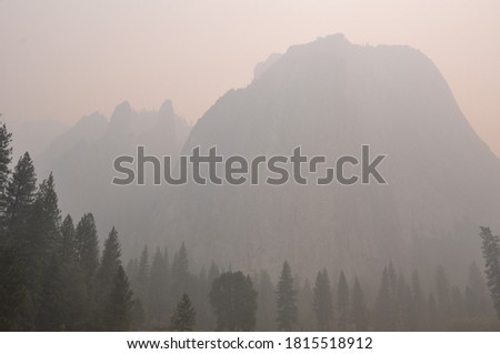Extremely hazy and smokey view of mountains and trees, taken from Yosemite Valley during wildfire season