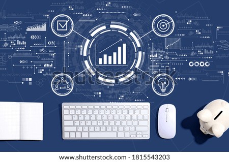 Marketing concept with a computer keyboard and a piggy bank
