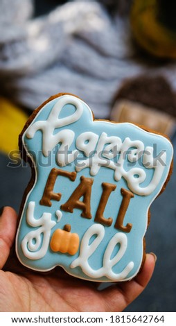 happy fall cookies on dark background. place for text. autumn concept.
