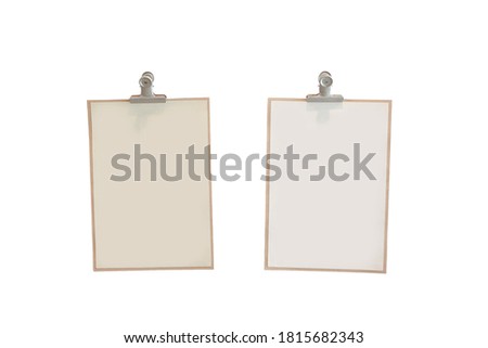 Two frame sheets of paper with paper clips on white background.