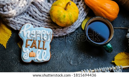 happy fall cookies on dark background. place for text. autumn concept.