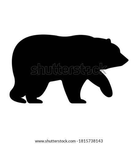 Brown bear, silhouette side view, isolated on a white background. The symbol of the stock market