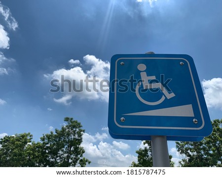 Blue sign for wheelchair ramp