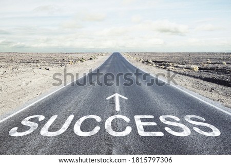 Road that says success in the asphalt. Start straight for business concept