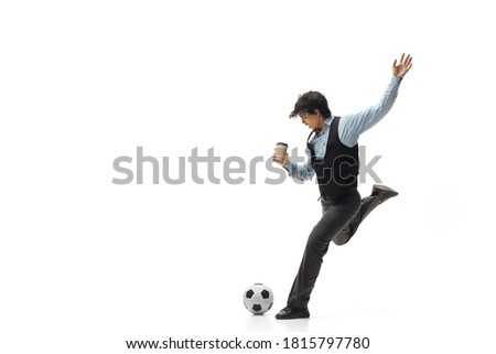 Office man playing football on white background