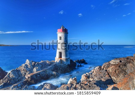 Porto Cervo- Capo Ferro lighthouse Royalty-Free Stock Photo #1815859409