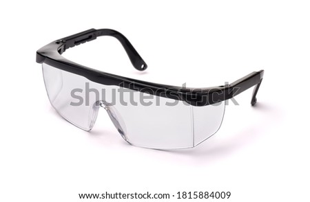 Clear plastic safety goggles isolated on white Royalty-Free Stock Photo #1815884009