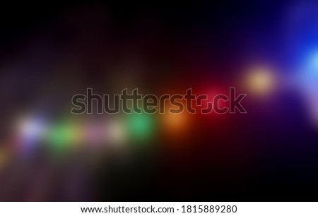 Night colored lights background stock images. Festive glowing background with copy space. Dark bokeh party lights stock photo
