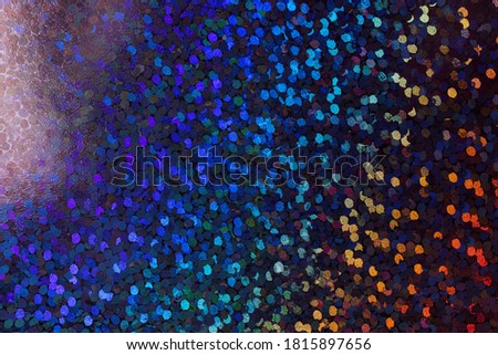 macro photo of cool rainbow holographic dot foil material, colorful hologram surface, glitter pixel pattern background.