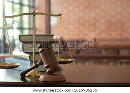 Law, Legal Concept. Judge gavel with law book, scales of justice in lawyer firm.
