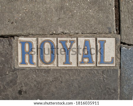 Royal Street Maker Tiles in New Orleans Set in Stone Sidewalk